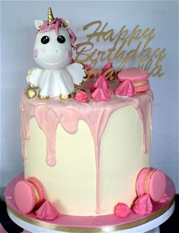 flying unicorn drip cakes for girls are a real hit right now. This image was taken in Johannesburg, South Africa