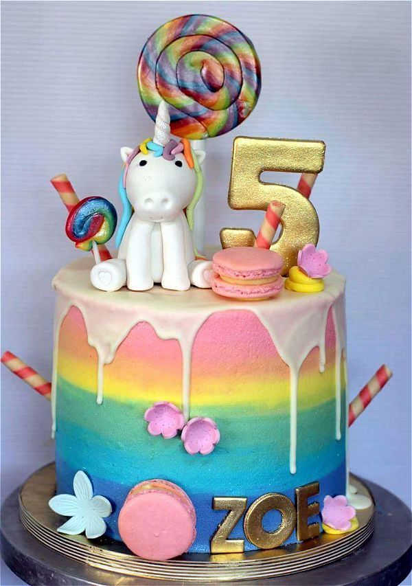 5th birthday party with a cute unicorn drip cake theme. Lovely with the dripping icing. This image was taken in Johannesburg, South Africa